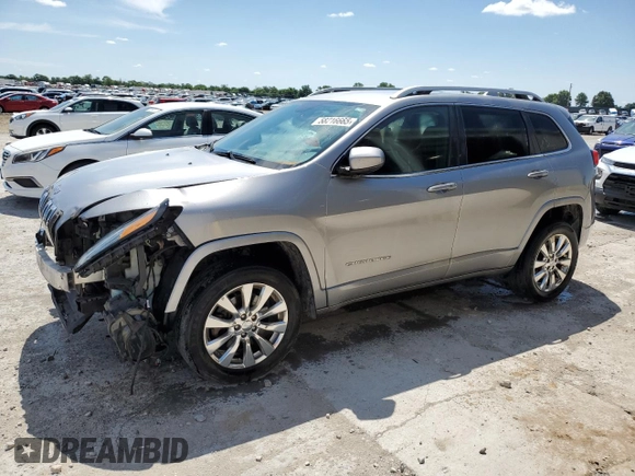2016 Jeep Cherokee Overland z VIN 1C4PJMJSXGW300719, wystawiony jako Copart lot #58216665 z przebiegiem 128 016 mil mil oraz Szkoda całkowita • Salvage title. Historia ofert i sprzedaży dostępna na DreamBid. Obrazek 1.