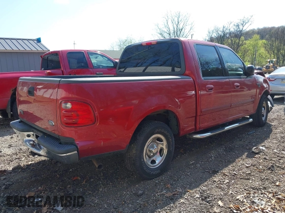 2003 Ford F-150 XLT with VIN 1FTRW07L13KD81923, listed as a IAAI auction lot 42112168 with 147,039 mi miles. Bid and sale history available at carsss.com. Image 4.