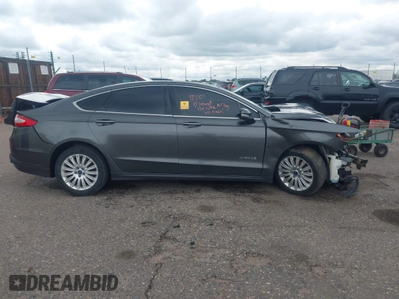 2016 Ford Fusion SE Hybrid with VIN 3FA6P0LU1GR191528, listed as a IAAI auction lot 42283058 with Not provided miles and . Bid and sale history available at DreamBid. Image 12.