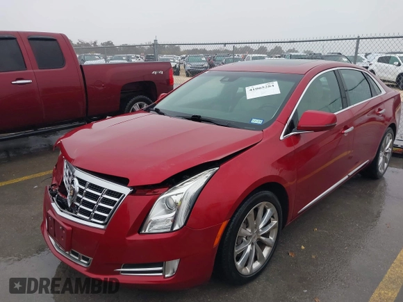 2013 Cadillac XTS Luxury with VIN 2G61P5S32D9115640, listed as a IAAI auction lot 41065284 with 125,643 mi miles and . Bid and sale history available at carsss.com. Image 19.