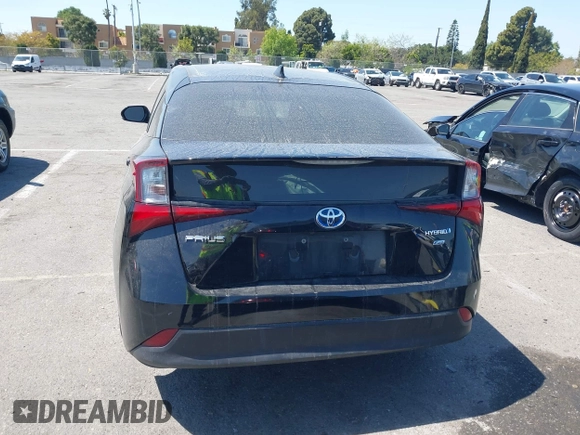 2019 Toyota Prius L Eco with VIN JTDKARFU0K3087064, listed as a IAAI auction lot 41986365 with 81,735 mi miles. Bid and sale history available at carsss.com. Image 16.