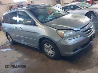 2007 Honda Odyssey EX-L with VIN 5FNRL38757B081459, listed as a IAAI auction lot 41408929 with 172,250 mi miles. Bid and sale history available at carsss.com. Image 1.