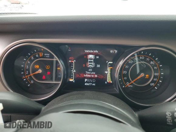 2021 Jeep Wrangler 80th Anniversary with VIN 1C4HJXAG1MW721452, listed as a Copart auction lot 62349904 with 40,677 mi miles and Salvage Title. Bid and sale history available at DreamBid. Image 9.