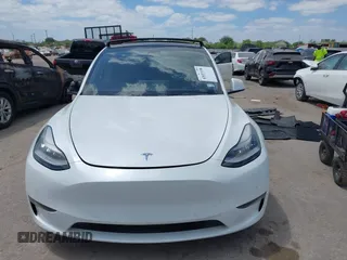 2021 Tesla Model Y Performance with VIN 5YJYGDEF9MF081798, listed as a IAAI auction lot 42033358 with 64,679 mi miles and . Bid and sale history available at DreamBid. Image 13.