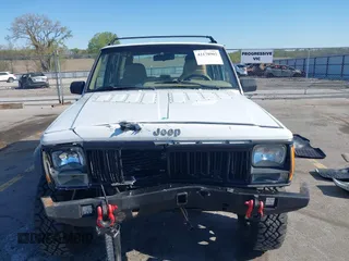 1995 Jeep Cherokee Sport with VIN 1J4FJ68S1SL576255, listed as a IAAI auction lot 42178902 with 214,041 mi miles and . Bid and sale history available at DreamBid. Image 12.