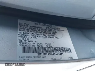 2004 Mercury Grand Marquis GS z VIN 2MEFM74W64X604289, wystawiony jako IAAI lot #42146281 z przebiegiem Nie podano mil oraz . Historia ofert i sprzedaży dostępna na DreamBid. Obrazek 9.