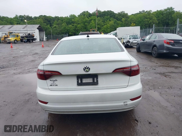 2021 Volkswagen Jetta S z VIN 3VWC57BU9MM103778, wystawiony jako IAAI lot #42493041 z przebiegiem 74 723 mil mil oraz . Historia ofert i sprzedaży dostępna na DreamBid. Obrazek 16.