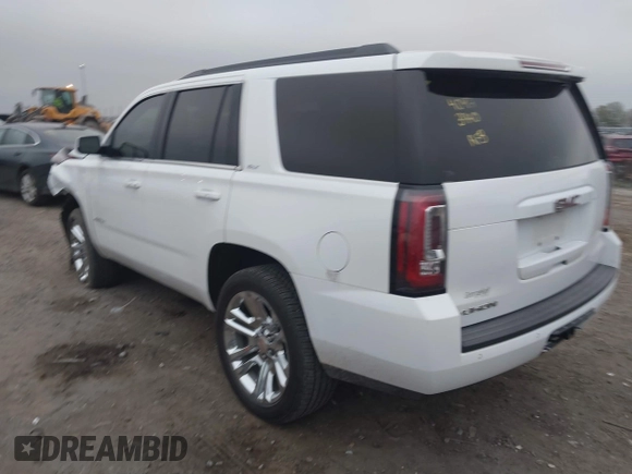 2018 GMC Yukon SLT with VIN 1GKS1BKC3JR279163, listed as a IAAI auction lot 40973940 with 122,445 mi miles. Bid and sale history available at carsss.com. Image 3.