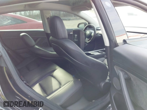 2022 Tesla Model 3 Long Range with VIN 5YJ3E1EB6NF343869, listed as a IAAI auction lot 41826077 with 36,643 mi miles and . Bid and sale history available at DreamBid. Image 8.