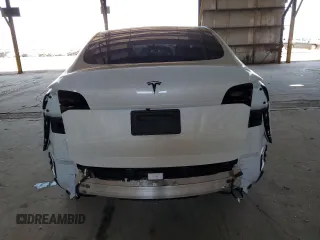 2021 Tesla Model Y Long Range z VIN 5YJYGDEE2MF243858, wystawiony jako Copart lot #58043055 z przebiegiem 24 128 mil mil oraz Szkoda całkowita • Salvage title. Historia ofert i sprzedaży dostępna na DreamBid. Obrazek 6.