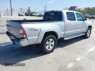 2009 Toyota Tacoma PreRunner with VIN 3TMKU72N79M021730, listed as a IAAI auction lot 42666355 with 141,325 mi miles and . Bid and sale history available at DreamBid. Image 4.