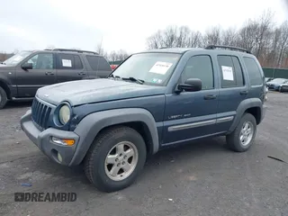 2002 Jeep Liberty Sport with VIN 1J8GL48K62W298212, listed as a IAAI auction lot 41918130 with 226,299 mi miles. Bid and sale history available at carsss.com. Image 2.