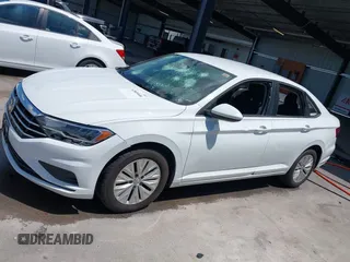 2019 Volkswagen Jetta S z VIN 3VWC57BU7KM200586, wystawiony jako IAAI lot #42609606 z przebiegiem 72 874 mil mil oraz . Historia ofert i sprzedaży dostępna na DreamBid. Obrazek 14.