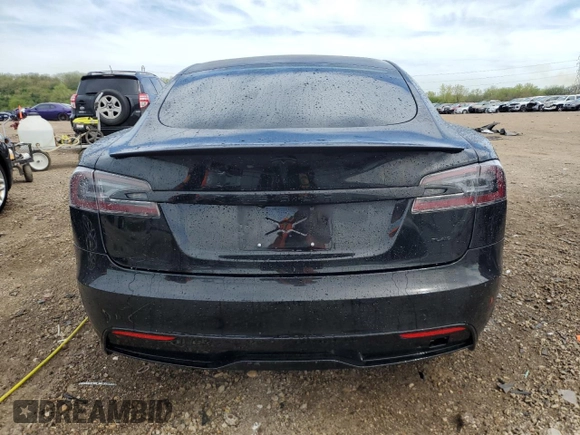 2021 Tesla Model S Plaid with VIN 5YJSA1E6XMF456295, listed as a Copart auction lot 55877025 with Not provided miles and Salvage title. Bid and sale history available at DreamBid. Image 6.