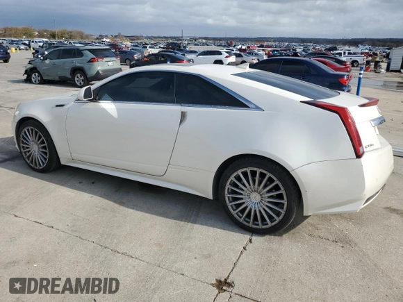 2014 Cadillac CTS Performance with VIN 1G6DG1E35E0190085, listed as a Copart auction lot 84347104 with 142,720 mi miles and Salvage title. Bid and sale history available at DreamBid. Image 2.