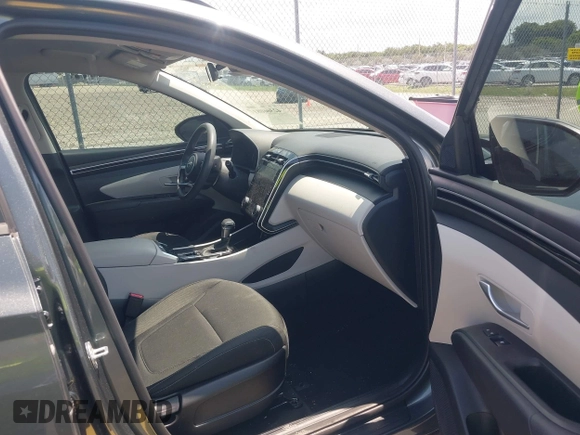 2022 Hyundai Tucson SEL with VIN 5NMJB3AE3NH069301, listed as a IAAI auction lot 42366081 with 26,971 mi miles and . Bid and sale history available at DreamBid. Image 5.