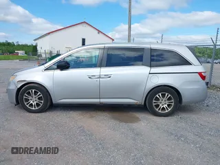 2012 Honda Odyssey EX-L with VIN 5FNRL5H63CB063815, listed as a IAAI auction lot 42302937 with 377,768 mi miles and . Bid and sale history available at DreamBid. Image 14.