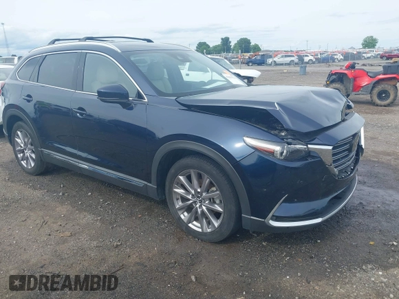 2020 Mazda CX-9 Grand Touring with VIN JM3TCBDY1L0402718, listed as a IAAI auction lot 42355511 with 87,205 mi miles and . Bid and sale history available at DreamBid. Image 1.