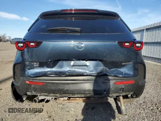 2023 Mazda CX-50 S Premium Plus with VIN 7MMVABEM8PN129773, listed as a Copart auction lot 82489824 with 31,567 mi miles and Salvage Title. Bid and sale history available at DreamBid. Image 6.
