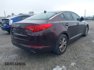 2013 Kia Optima EX with VIN 5XXGN4A74DG111397, listed as a IAAI auction lot 41977063 with 113,571 mi miles. Bid and sale history available at carsss.com. Image 4.