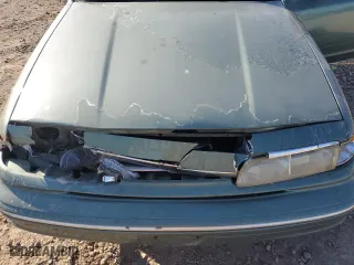 1997 Ford Crown Victoria with VIN 2FALP73W6VX173232, listed as a Copart auction lot 77805094 with 228,871 mi miles and Salvage Title. Bid and sale history available at carsss.com. Image 13.