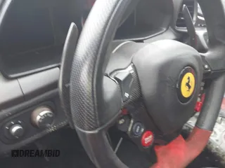 2011 Ferrari 458 Italia z VIN ZFF67NFA4B0179652, wystawiony jako IAAI lot #40499917 z przebiegiem Nie podano mil oraz . Historia ofert i sprzedaży dostępna na DreamBid. Obrazek 7.