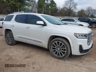 2021 GMC Acadia Denali with VIN 1GKKNPLS1MZ139821, listed as a IAAI auction lot 41455357 with 61,265 mi miles and . Bid and sale history available at carsss.com. Image 1.