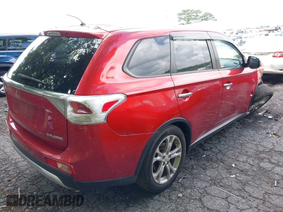 2015 Mitsubishi Outlander SE with VIN JA4AD3A35FZ005812, listed as a IAAI auction lot 42302752 with 165,483 mi miles and . Bid and sale history available at DreamBid. Image 4.