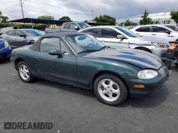 1999 Mazda MX-5 Miata z VIN JM1NB3539X0107918, wystawiony jako Copart lot #56693795 z przebiegiem 42 518 mil mil oraz Czysty tytuł • Clean title. Historia ofert i sprzedaży dostępna na DreamBid. Obrazek 4.
