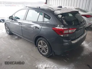 2018 Subaru Impreza Premium z VIN 4S3GTAB6XJ3727210, wystawiony jako IAAI lot #41336223 z przebiegiem 75 305 mil mil oraz . Historia ofert i sprzedaży dostępna na DreamBid. Obrazek 3.