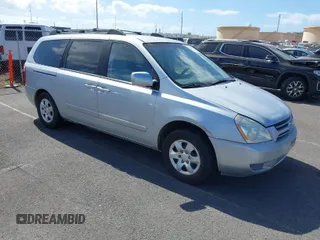 2007 Kia Sedona EX with VIN KNDMB233676155186, listed as a IAAI auction lot 41999179 with 150,155 mi miles. Bid and sale history available at carsss.com. Image 1.