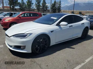 2020 Tesla Model S Performance with VIN 5YJSA1E42LF401157, listed as a Copart auction lot 55082875 with 60,376 mi miles and Salvage title. Bid and sale history available at DreamBid. Image 1.