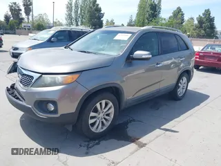 2011 Kia Sorento EX with VIN 5XYKUDA29BG055919, listed as a IAAI auction lot 42105406 with 146,302 mi miles. Bid and sale history available at carsss.com. Image 2.