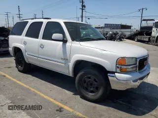 2005 GMC Yukon SLT z VIN 1GKEC13V65J174655, wystawiony jako Copart lot #59050755 z przebiegiem 93 893 mil mil oraz Czysty tytuł • Clean title. Historia ofert i sprzedaży dostępna na DreamBid. Obrazek 4.