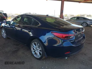 2016 Mazda 6 i Touring with VIN JM1GJ1T5XG1434388, listed as a IAAI auction lot 41528124 with 99,293 mi miles and . Bid and sale history available at DreamBid. Image 3.