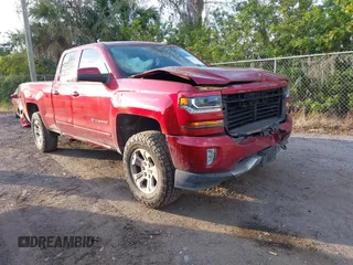 2019 Chevrolet Silverado 1500 LT with VIN 2GCVKPEC2K1180858, listed as a IAAI auction lot 41513814 with 103,765 mi miles and . Bid and sale history available at DreamBid. Image 1.