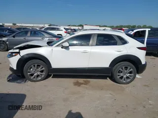 2023 Mazda CX-30 S Carbon Edition with VIN 3MVDMBCM2PM552282, listed as a IAAI auction lot 42241909 with 14,765 mi miles and . Bid and sale history available at DreamBid. Image 14.
