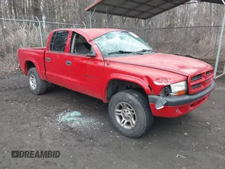 2002 Dodge Dakota Sport with VIN 1B7HG38N52S510495, listed as a IAAI auction lot 41694757 with 254,713 mi miles. Bid and sale history available at carsss.com. Image 1.