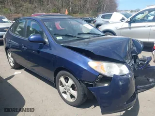 2009 Hyundai Elantra SE with VIN KMHDU46D79U818575, listed as a IAAI auction lot 42075991 with 215,096 mi miles. Bid and sale history available at carsss.com. Image 1.
