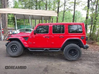 2018 Jeep Wrangler Unlimited Rubicon with VIN 1C4HJXFG3JW273266, listed as a IAAI auction lot 42093919 with 90,700 mi miles and . Bid and sale history available at DreamBid. Image 14.