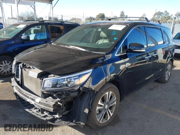 2021 Kia Sedona EX with VIN KNDMC5C10M6671729, listed as a IAAI auction lot 40858206 with 58,775 mi miles. Bid and sale history available at carsss.com. Image 18.