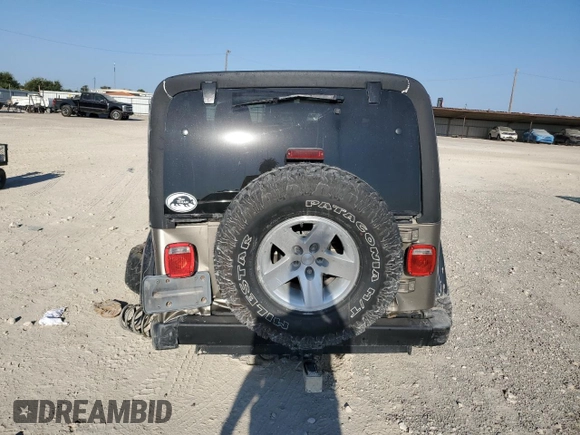 2003 Jeep Wrangler Rubicon with VIN 1J4FA69S73P339925, listed as a Copart auction lot 75341094 with Not provided miles and Salvage title. Bid and sale history available at DreamBid. Image 6.
