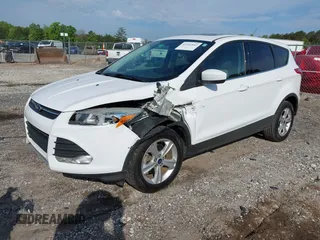 2014 Ford Escape SE with VIN 1FMCU0GXXEUC64892, listed as a IAAI auction lot 42101842 with 128,932 mi miles and . Bid and sale history available at DreamBid. Image 2.