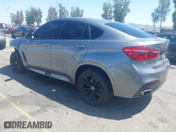 2018 BMW X6 xDrive35i z VIN 5UXKU2C51J0X50913, wystawiony jako IAAI lot #42078443 z przebiegiem Nie podano mil oraz . Historia ofert i sprzedaży dostępna na DreamBid. Obrazek 3.