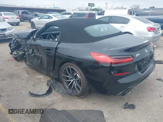 2022 BMW Z4 sDrive30i with VIN WBAHF3C05NWX43513, listed as a IAAI auction lot 41581487 with 9,651 mi miles. Bid and sale history available at carsss.com. Image 3.