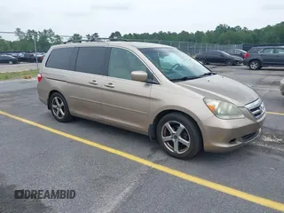 2007 Honda Odyssey Touring z VIN 5FNRL38867B076568, wystawiony jako IAAI lot #42355334 z przebiegiem 211 726 mil mil oraz . Historia ofert i sprzedaży dostępna na DreamBid. Obrazek 1.