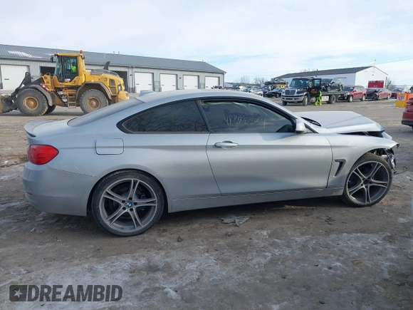 2015 BMW 4 Series 428i xDrive with VIN WBA3N9C53FK247985, listed as a IAAI auction lot 41395534 with 76,856 mi miles and . Bid and sale history available at DreamBid. Image 13.