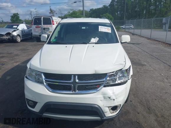 2015 Dodge Journey SXT with VIN 3C4PDCBG0FT653857, listed as a IAAI auction lot 42128410 with 182,960 mi miles and . Bid and sale history available at DreamBid. Image 12.