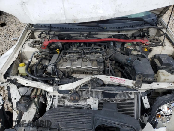 2002 Mazda Protege z VIN JM1BJ245721470434, wystawiony jako Copart lot #57293765 z przebiegiem 144 622 mil mil oraz Szkoda całkowita • Salvage title. Historia ofert i sprzedaży dostępna na DreamBid. Obrazek 11.