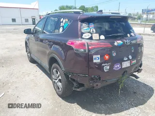 2018 Toyota RAV4 LE with VIN 2T3BFREV2JW781018, listed as a IAAI auction lot 42302802 with 44,165 mi miles and . Bid and sale history available at DreamBid. Image 3.